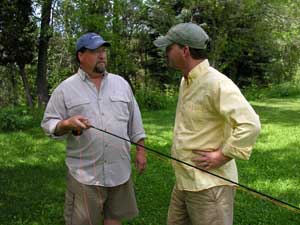 Two David discussing casting a fly rod